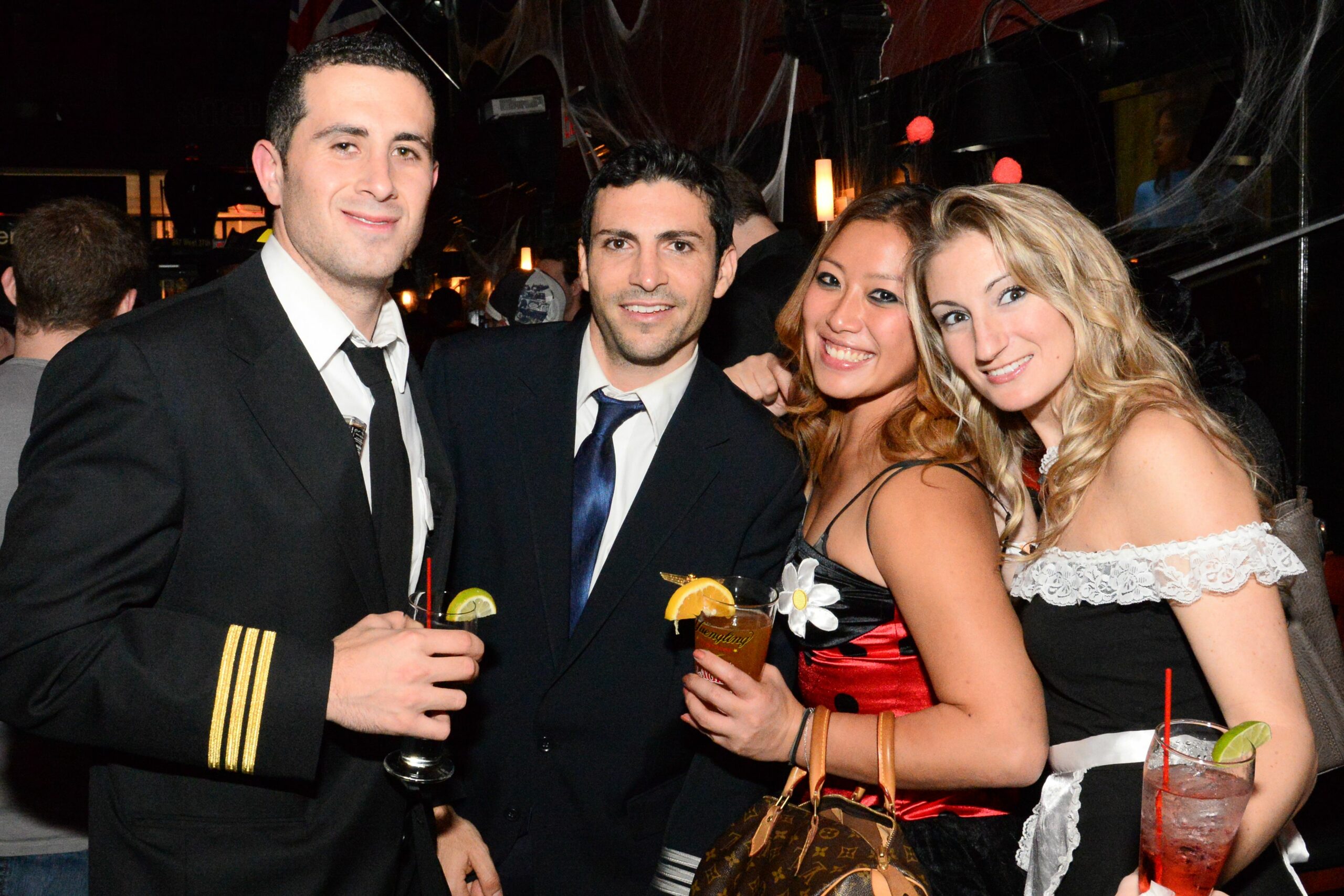 “Stylish Halloween party goers at Boo Bash 2025 inside The Continental Club, hosted by Intellectual Blonde Events.”